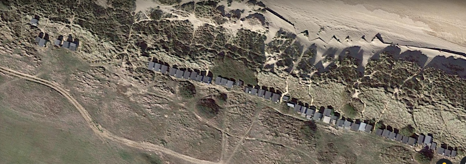 Beach huts on the common.png